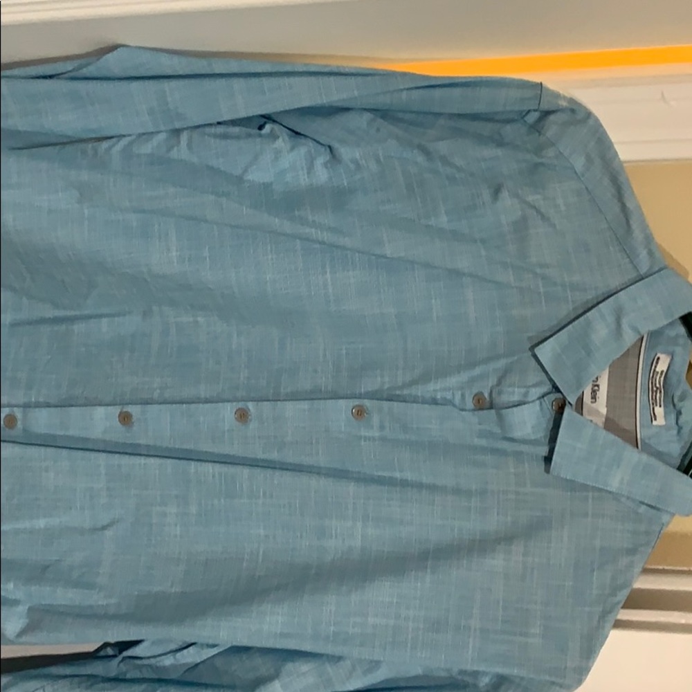 Two Calvin Klein infinite cool shirts